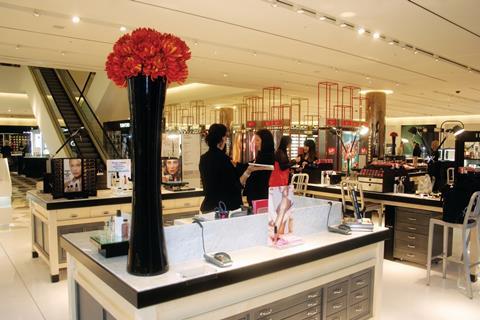 The basement beauty area’s glitzy, aspirational feel is enhanced by touches such as a shaft of natural light, the marble, tessellated floor and the top-lit mirrored pillars